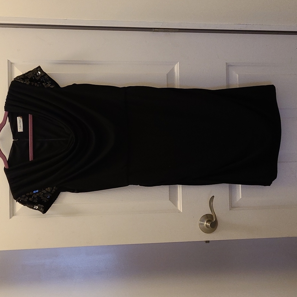 LBD with sequined sleeves